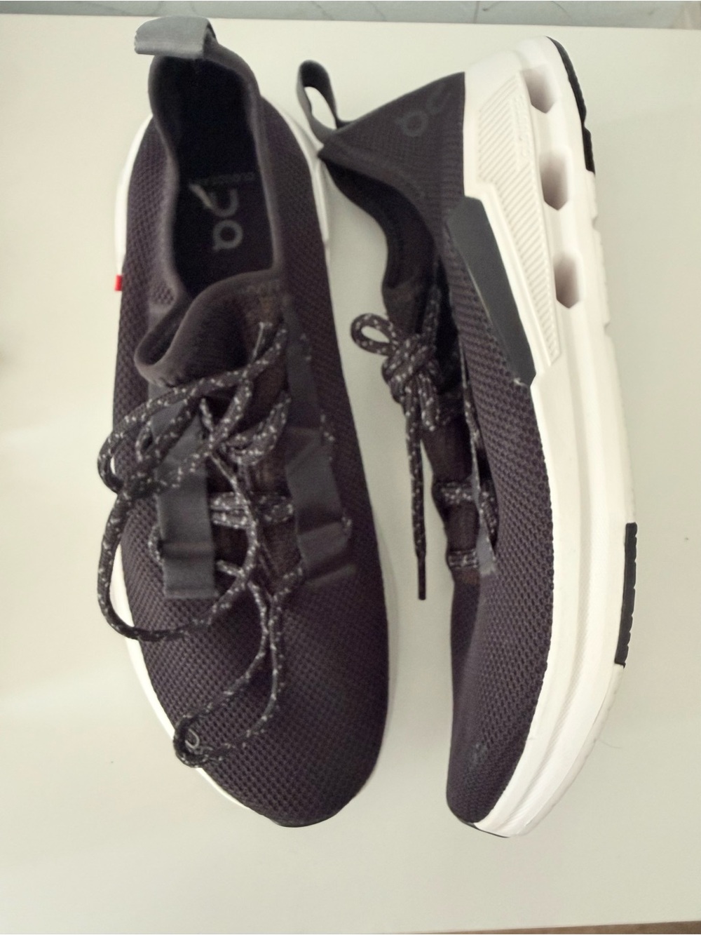 On Running Men’s Cloudnova Knit Sneakers — Black & White